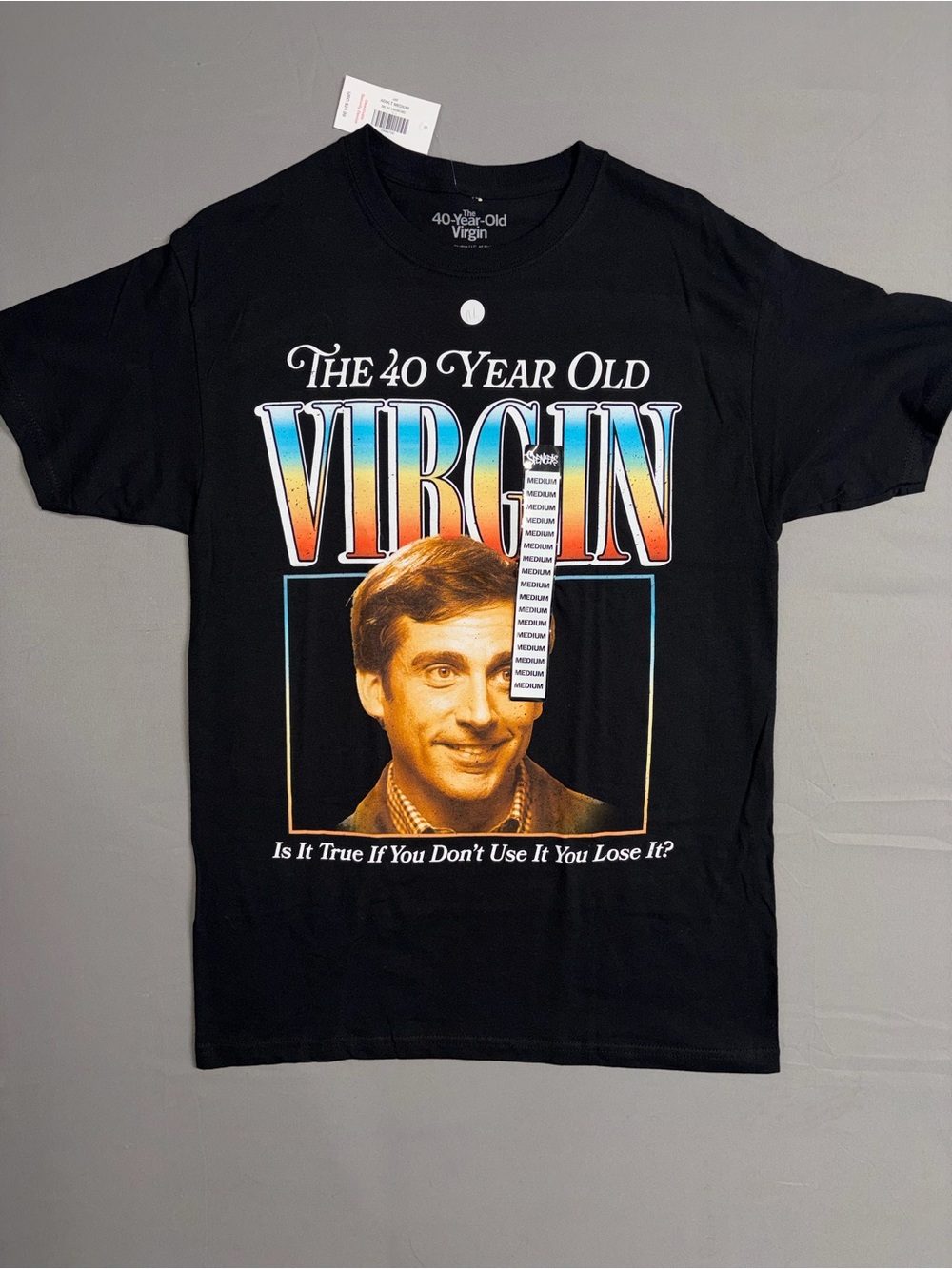 Spencer's Black 'The 40 Year Old Virgin' Graphic Tee with Multicolor Lettering